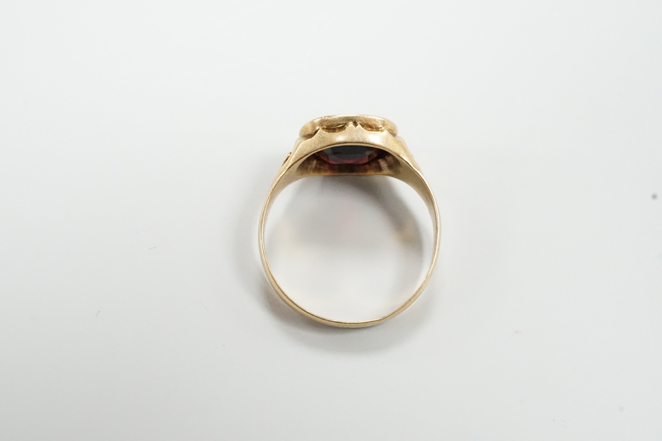 An early 20th century Austro-Hungarian? yellow metal and garnet set ring, size P/Q, gross weight 3.9 grams.